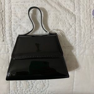 Mini trapezoid crossbody purse